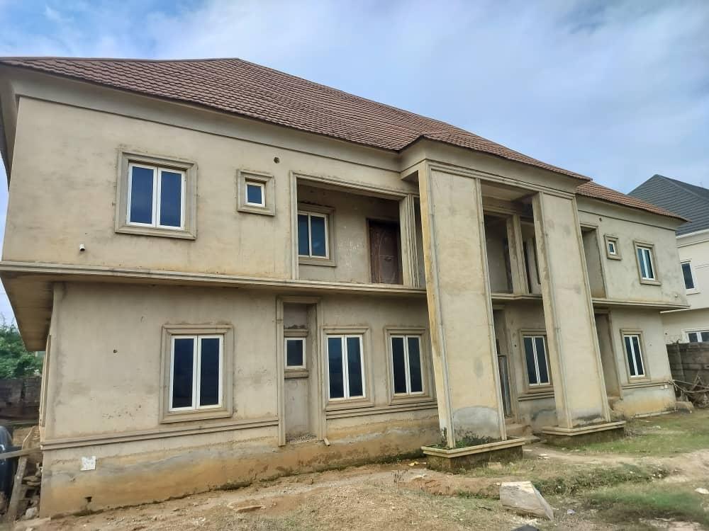 SUPER DISTRESS @ JAHI  Solidly built 2 units of 5 bedrooms semi detached duplexes Advance finished, almost completed.