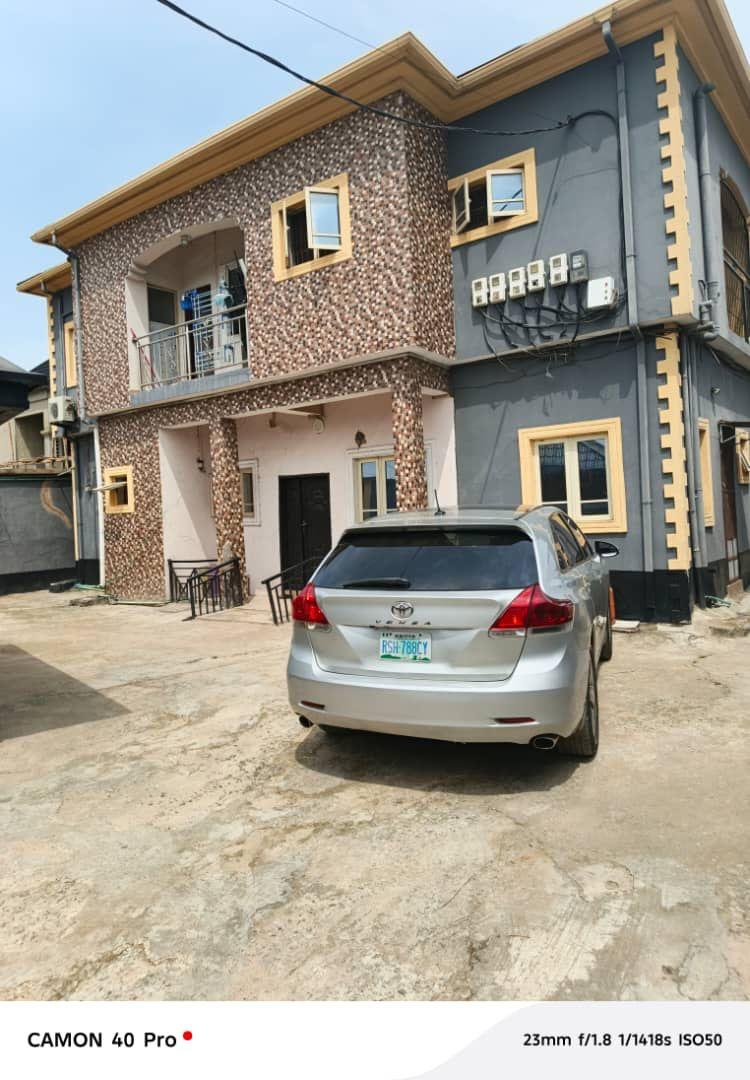 For Sale  A story building on a full plot of land