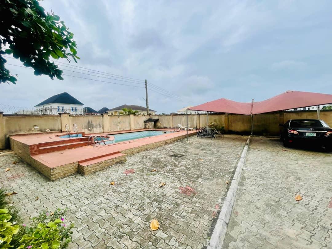 FOR SALE   A  well built 6 Bedroom fully  Detached duplex with 3  Bedroom chalet with Gate House, and swimming pool located at Beachwood Estate Bogije ibeju Lekki Lagos.   @600million Naira