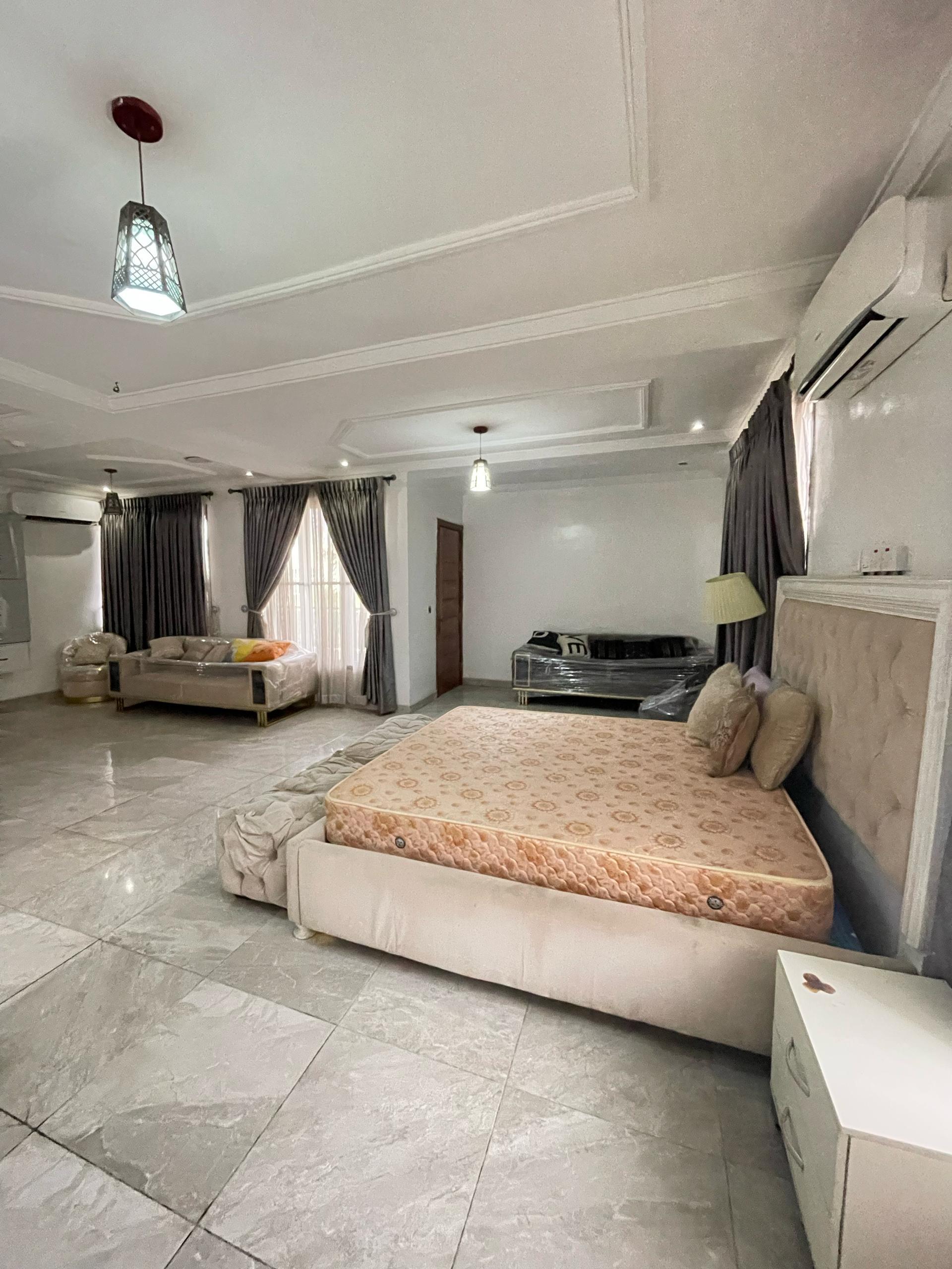 WONDERFULLY FINISHED 7BEDROOM FULLY DETACHED DUPLEX (TWO PROPERTIES IN ONE) WITH TWO MASSIVE BQs FOR SALE