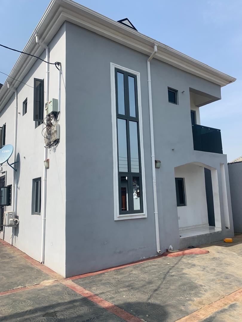 UST OUT FOR SALE  JUST A YEAR OLD OF MODERN BEAUTIFUL BLOCKS OF FLAT WITH PACKING SPACE  ON MORE THAN A PLOT OF LAND