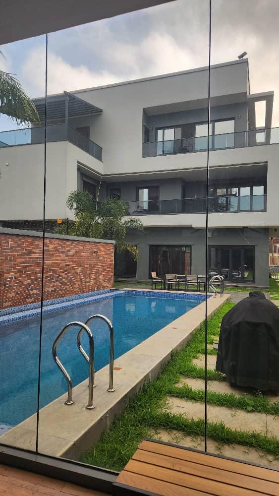 Luxury fully furnished 2wing duplex of 11 bedrooms total with bq, gate house, swimming pool, gym, cinema, and all modern facilities.  House is fully automated with a remote.Price: 2 million USD