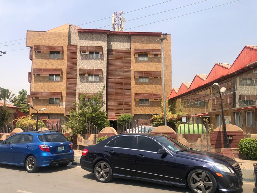 HOTEL FOR SALE @ WUSE ZONE 1. 49Rooms Functional hotel comprising of 42 rooms, 2 Suites and 5 Studio rooms with other facilities sitting on a land size 1700sqm though 1400sqm on paper.